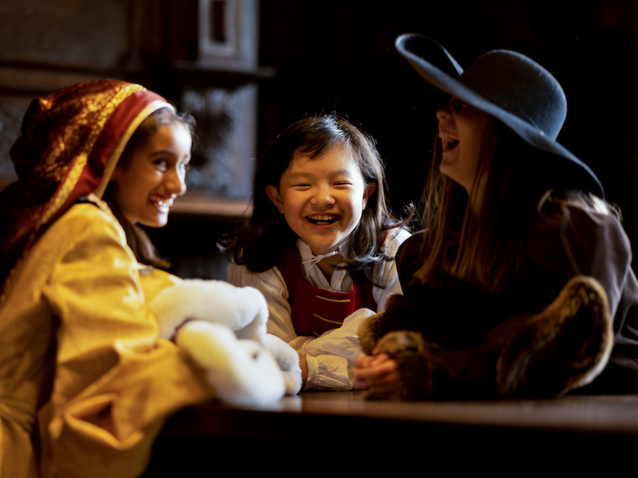 Image of children laughing at St Mary's Guildhall